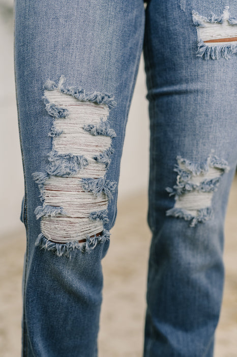 Maureen High Rise Distressed Bootcut Jeans