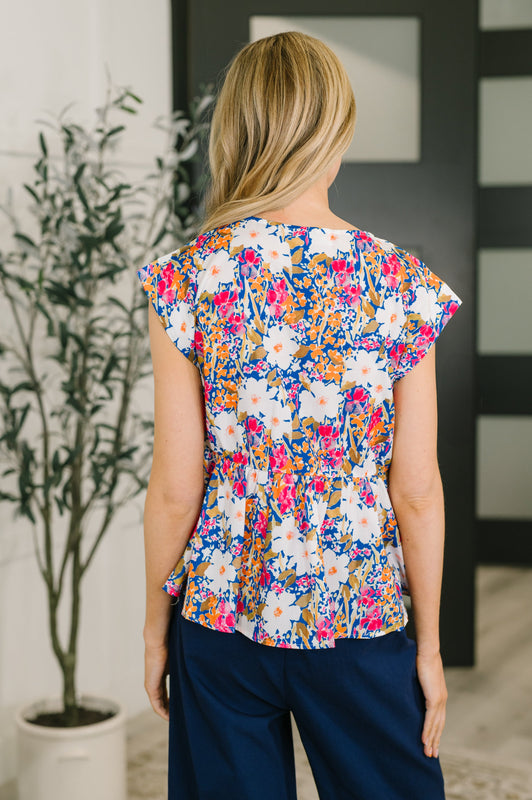 Mrs. Dependable Bow Detail Peplum Top